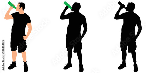 Casual young man drinking bottle of beer