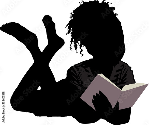 Silhouette of a child reading a book