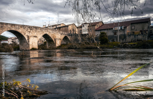 Medieval bridge over the river Zadorra, Armiñon, Basque Country.
