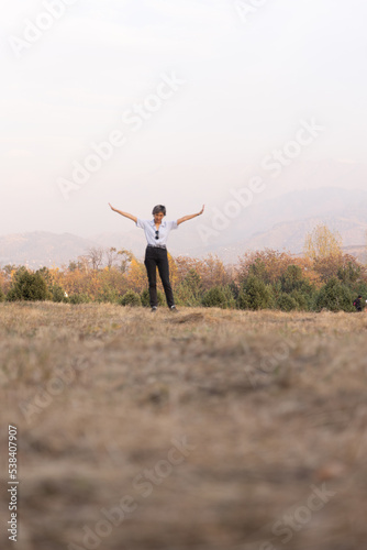 person jumping in the field