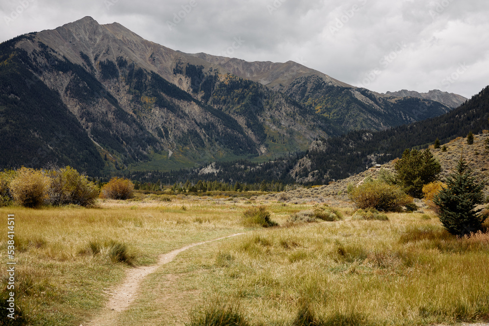 San Isabel National Forest trail with mountains in the distance at Twin Lakes, Colorado