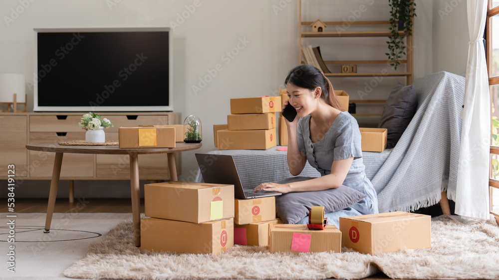 Asian small business owner working at home office. Business retail market and online sell marketing delivery, SME e-commerce concept Asian small business owner working at home office. Business retail market and online sell marketing delivery, SME e-commerce concept