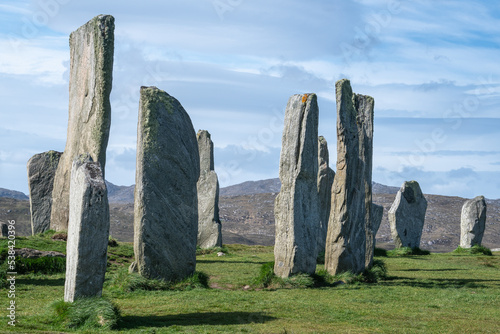 Callanish standing stones, Isle of Lewis, showing stone number 34 in the foreground, the high stone number 29, then next to it 41, 53, 52 and 51
