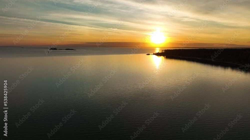 Flight over the river at sunset. Aerial view
Flight over the river at sunset. Aerial view