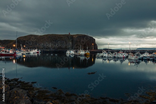 Beautiful shot of the Stykkisholmur harbor under the clouds in Iceland photo