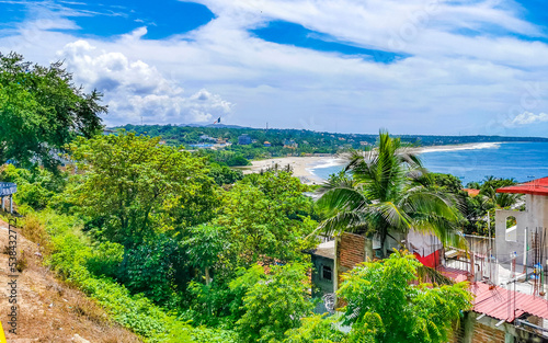 Extremely natural panorama surfer waves at beach Puerto Escondido Mexico. © arkadijschell