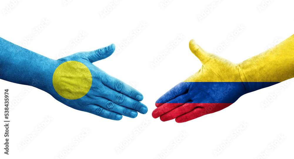 Handshake between Colombia and Palau flags painted on hands, isolated transparent image. Handshake between Colombia and Palau flags painted on hands, isolated transparent image.