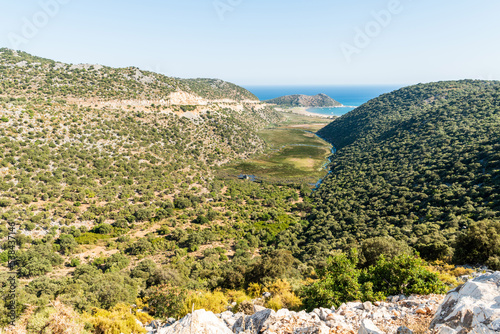 View over a valley and marshland hosting Andriake ruins in Antalya province of Turkey