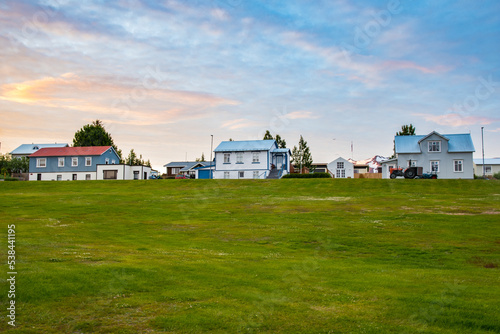 Summer sunset in the village on island of Hrisey in Iceland © Gestur
