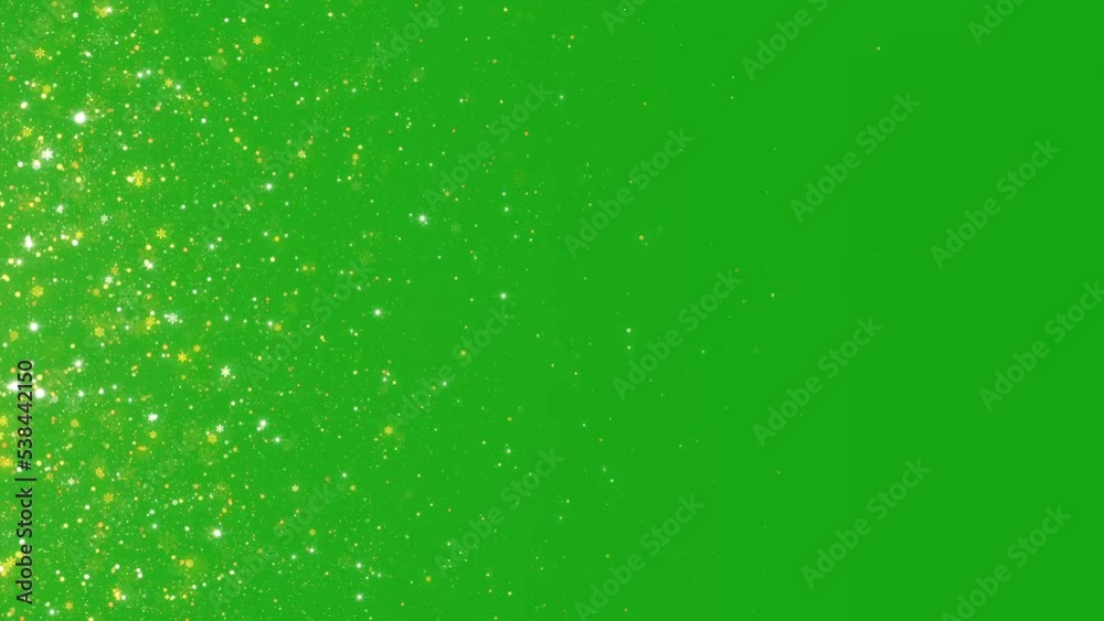 Christmas glitter particle falling from left on green screen. Christmas glitter particle falling with key color. Christmas and New year animation. Chroma key, 4K video