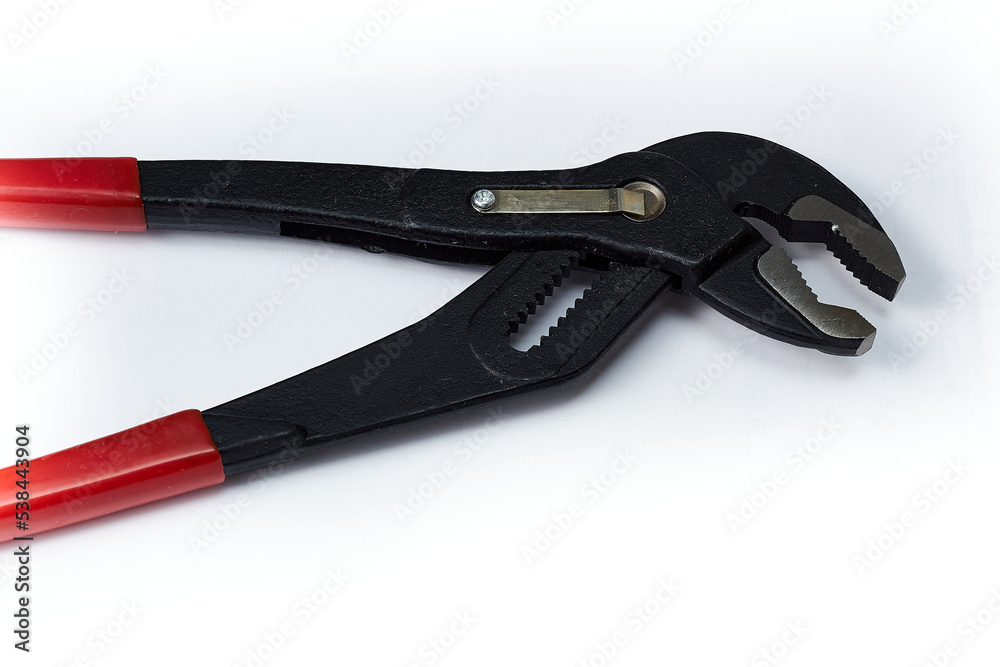 Wrench plumbing wrench on a white background. Wrench plumbing wrench on a white background.