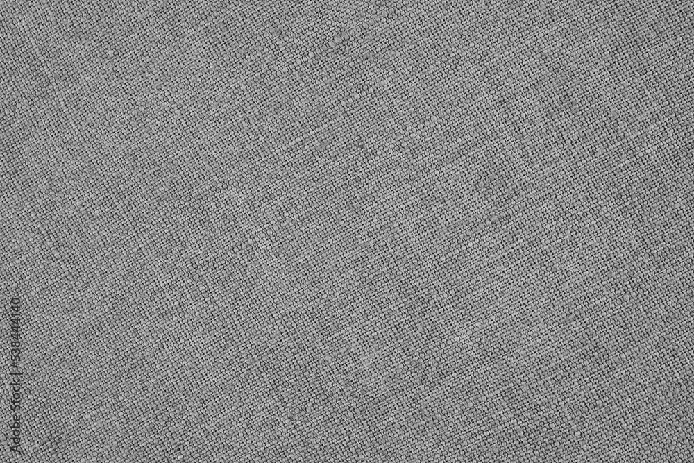 Gray woven surface close up. Linen textile texture. Fabric handicraft background. Textured braided grey backdrop. Len black and white wallpaper. Macro Gray woven surface close up. Linen textile texture. Fabric handicraft background. Textured braided grey backdrop. Len black and white wallpaper. Macro