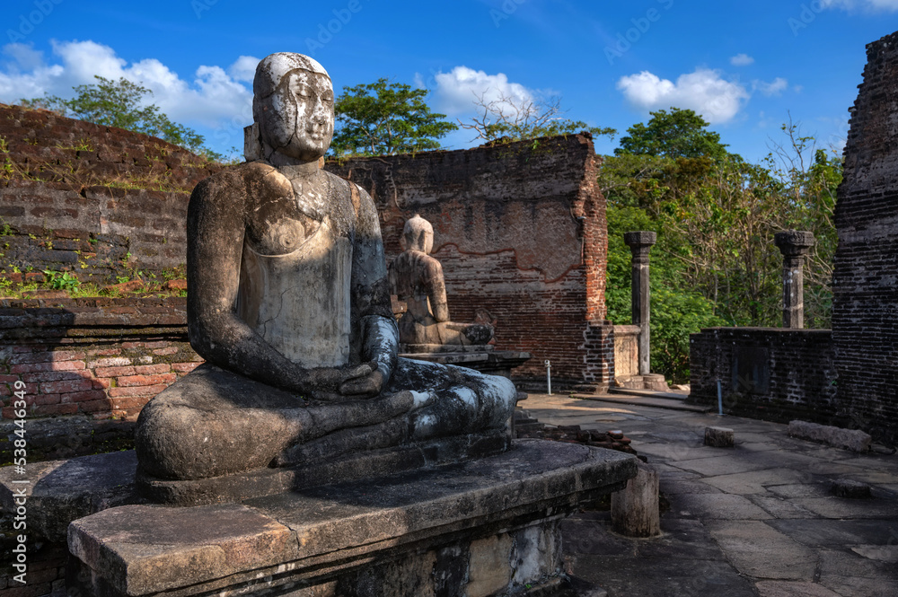 Buddha images in Vatadage temple in ruins of Polonnaruwa in Sri Lanka Buddha images in Vatadage temple in ruins of Polonnaruwa in Sri Lanka