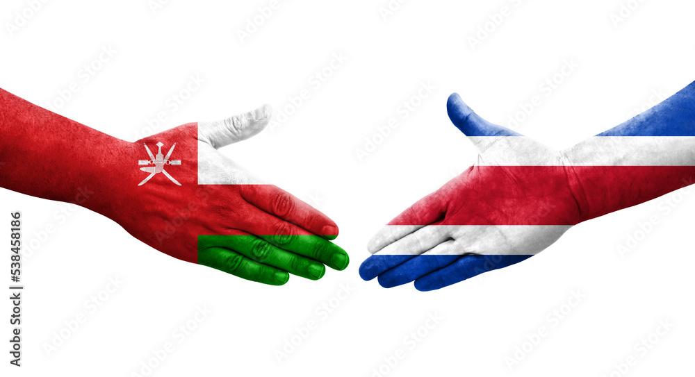 Handshake between Costa Rica and Oman flags painted on hands, isolated transparent image. Handshake between Costa Rica and Oman flags painted on hands, isolated transparent image.