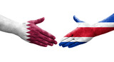 Handshake between Costa Rica and Qatar flags painted on hands, isolated transparent image.