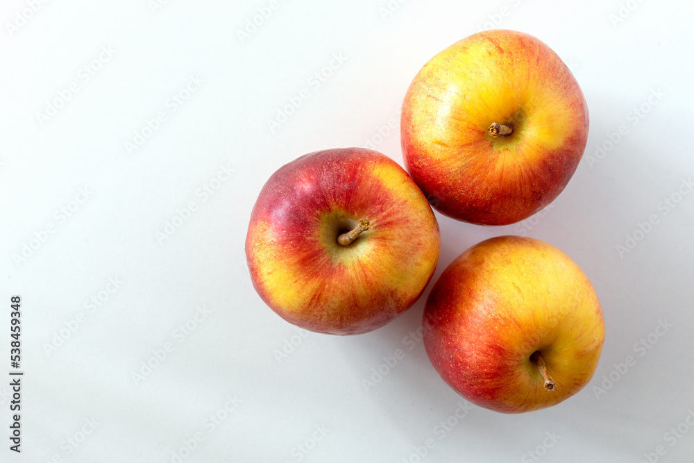 Fresh red apples on a white background. Top view Fresh red apples on a white background. Top view