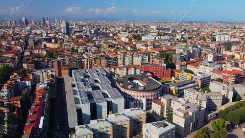 Aerial view of the cityscape and the main buildings of Bocconi University - Building Velodrome. Campus and library. Green lawns and trees. Students. Architecture. Milan Italy photo