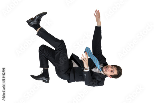 Scared businessman is falling down isolated on transparent background. photo