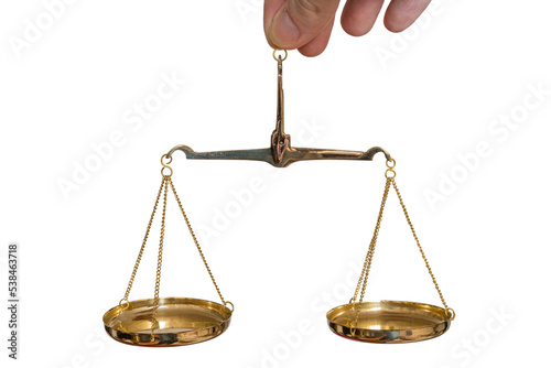 Hand is holding golden scale. Isolated on transparent background