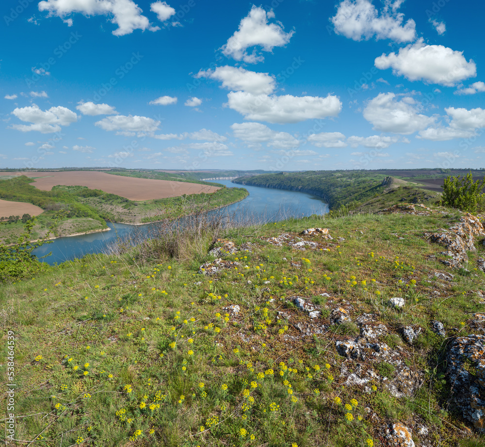 Obraz premium Amazing spring view on the Dnister River Canyon with picturesque rocks, fields, flowers. This place named Shyshkovi Gorby, Nahoriany, Chernivtsi region, Ukraine.
