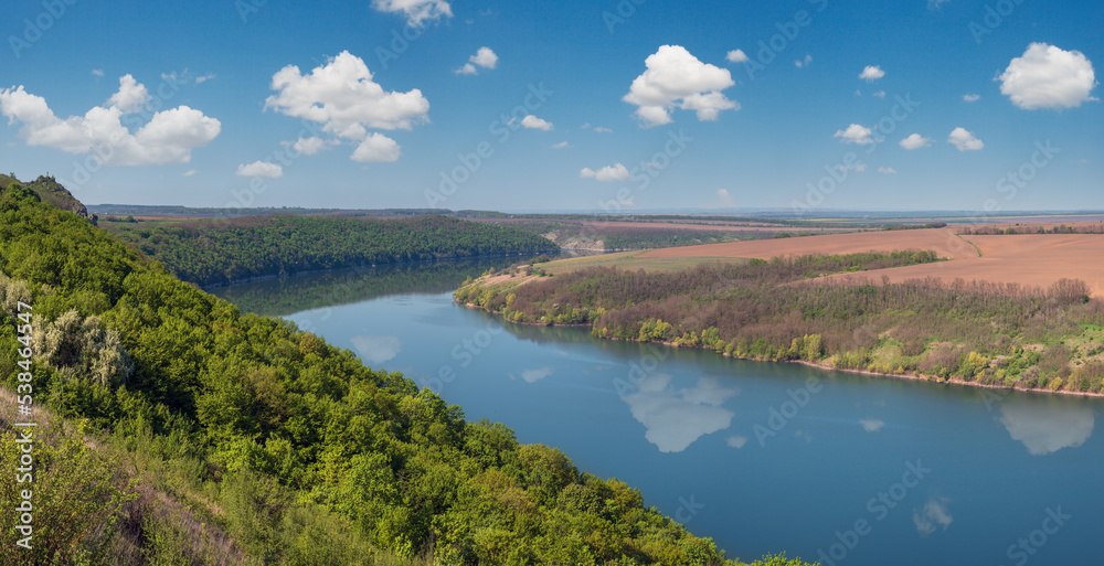 Amazing spring view on the Dnister River Canyon with picturesque rocks, fields, flowers. This place named Shyshkovi Gorby,  Nahoriany, Chernivtsi region, Ukraine.