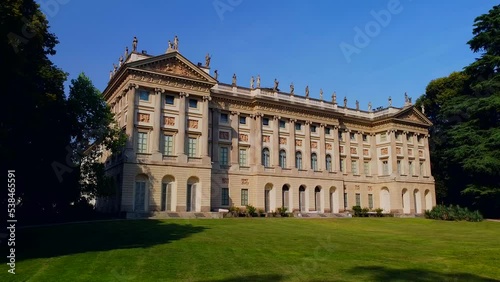 Wallpaper Mural Aerial view of summer trees in Giardini Indro Montanelli park and skyline with new skyscrapers. View of modern business offices. Business. Tourism. Ecology. Clouds over the city. Green Planet. Milan.  Torontodigital.ca