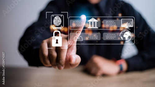 Concept of cyber security digital technology, business people use fingerprints to access personal cybersecurity, keeping users' personal information safe, secure internet access