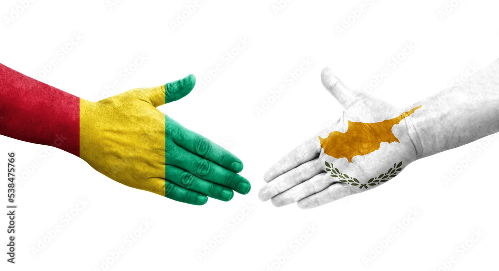 Handshake between Cyprus and Guinea flags painted on hands, isolated transparent image. Handshake between Cyprus and Guinea flags painted on hands, isolated transparent image.