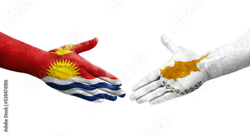 Handshake between Cyprus and Kiribati flags painted on hands  isolated transparent image.