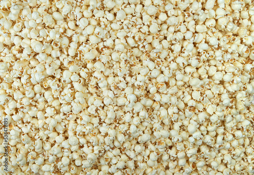Popcorn filling entire frame. Endless Popcorn. Popcorn for the movies and the cinema. Popcorn for the movie theater.