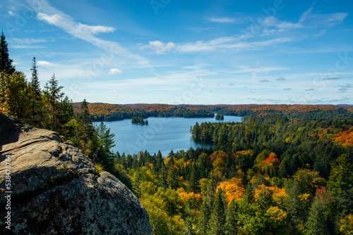Panorama of Algonquin park in fall - trees and lake