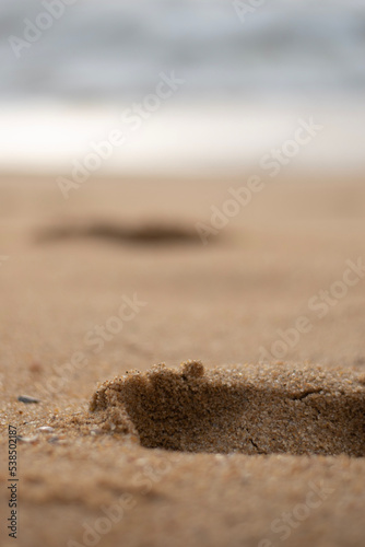 A picture of a footprints on the sand, symbolizing the memories the you leave behind in the journey of life