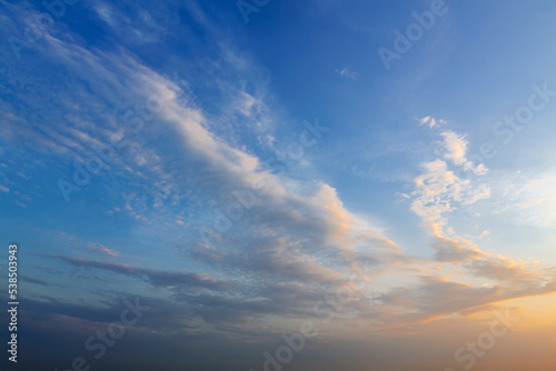 Evening sky with pink clouds, sunset and transition to regime time