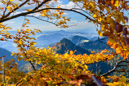 View from the top of Trzy Korony to the Pieniny mountains in autumn colors.