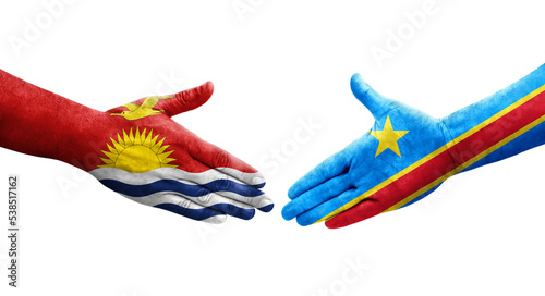 Handshake between Dr Congo and Kiribati flags painted on hands, isolated transparent image.