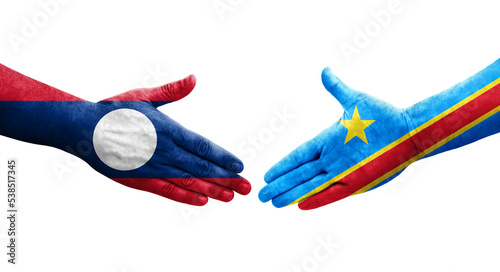 Handshake between Dr Congo and Laos flags painted on hands, isolated transparent image.