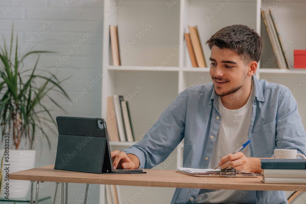 student working at home with laptop