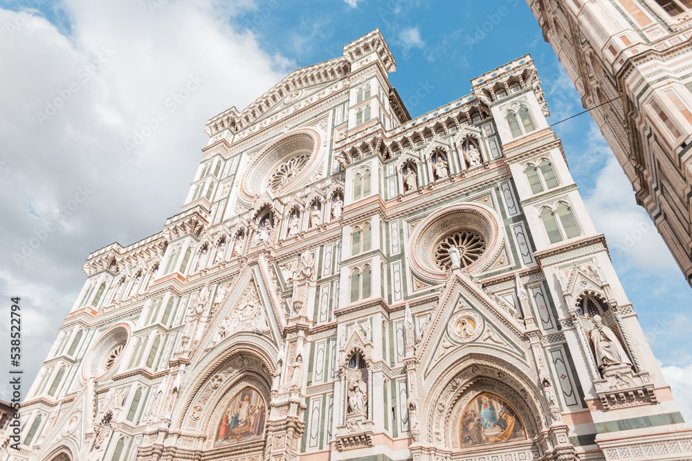 Amazingly beautiful Gothic architecture of the cathedral facade in the ancient European town of Florence, Italy
