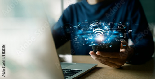 Business using smartphone ,with wifi icon,business communication social network concept.
