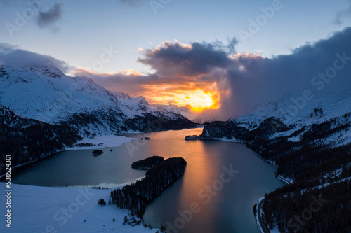 Saint Moritz, Switzerland: Aerial view of the sunset over lake Sils in the Engadine valley in the Swiss alps in Canton Graubunden photo