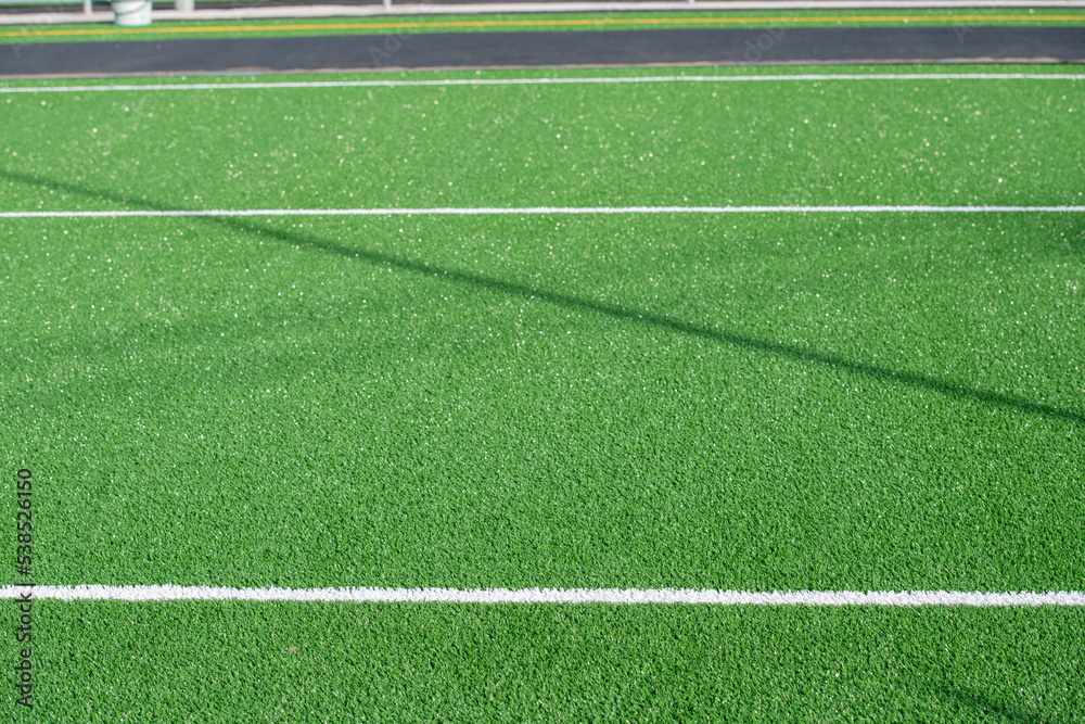 Laying of synthetic grass