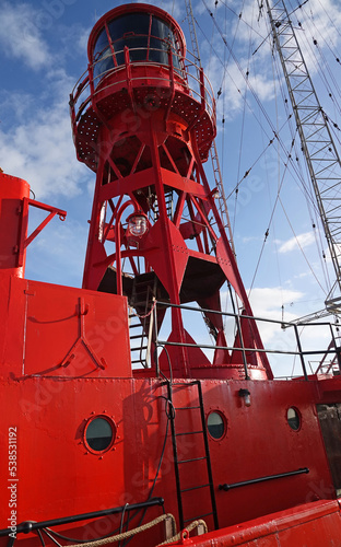 Canvastavla A red lighthouse on a lightvessel or lightship