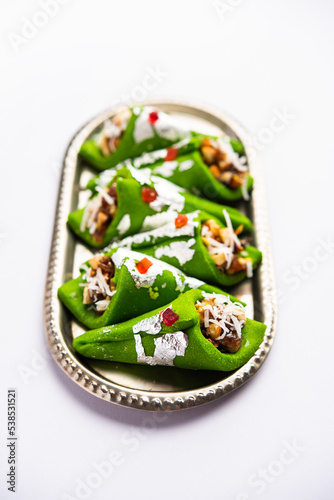Kaju Gulkand Paan Mithai barfi - Indian sweet or dessert served in a plate