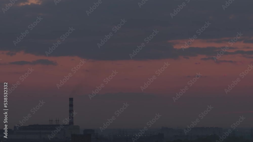 Timelapse, beautiful sunset clouds float over the city. Change of day and night Timelapse, beautiful sunset clouds float over the city. Change of day and night