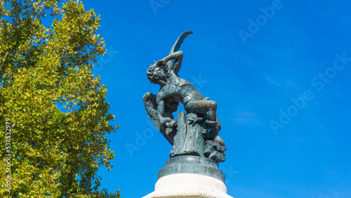 sculpture of the fallen angel at the Retiro, Madrid