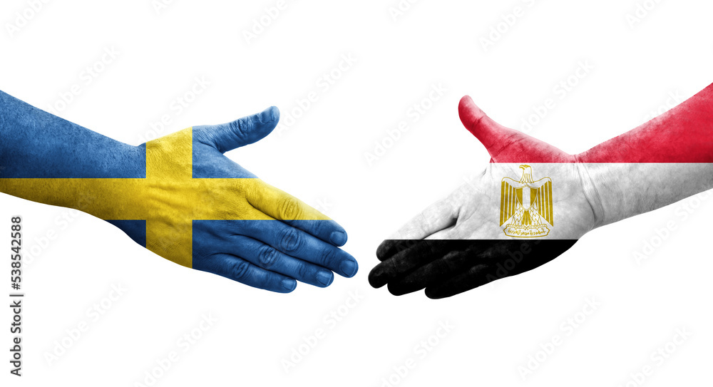Handshake between Egypt and Sweden flags painted on hands, isolated transparent image. Handshake between Egypt and Sweden flags painted on hands, isolated transparent image.