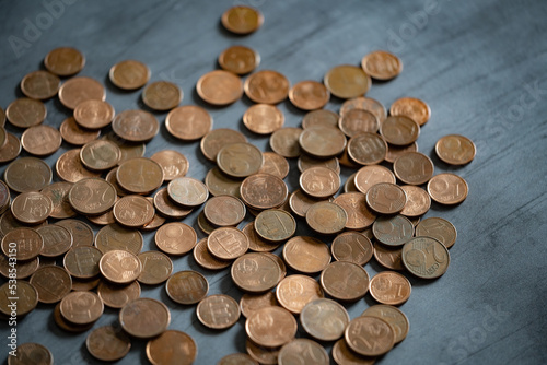 Heap of euro cents coins on metal surface. Money saving concept.