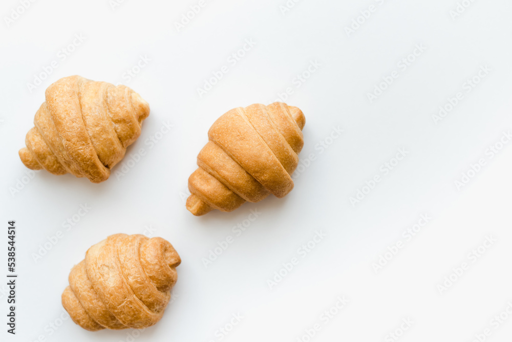 Croissants on a white background. Baking on a white background. Croissants on a white background. Baking on a white background.