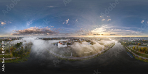 full hdri 360 panorama of earlier foggy morning and aerial view on medieval castle and promenade overlooking the old city and historic buildings near wide river in equirectangular projection © hiv360