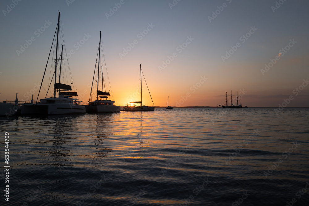 sunset on the sea yacht in harbour at sunset calm peaceful 